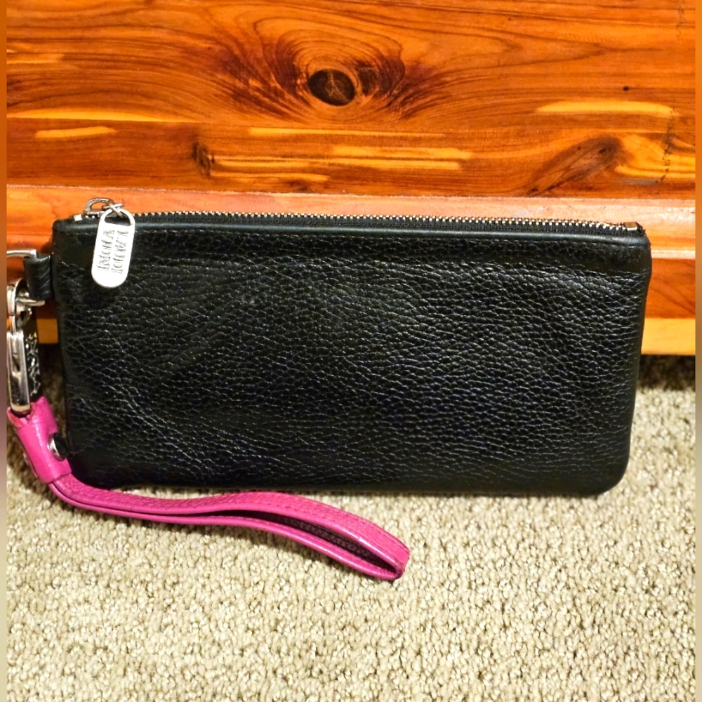 Laudi Vidni Black leather wristlet.